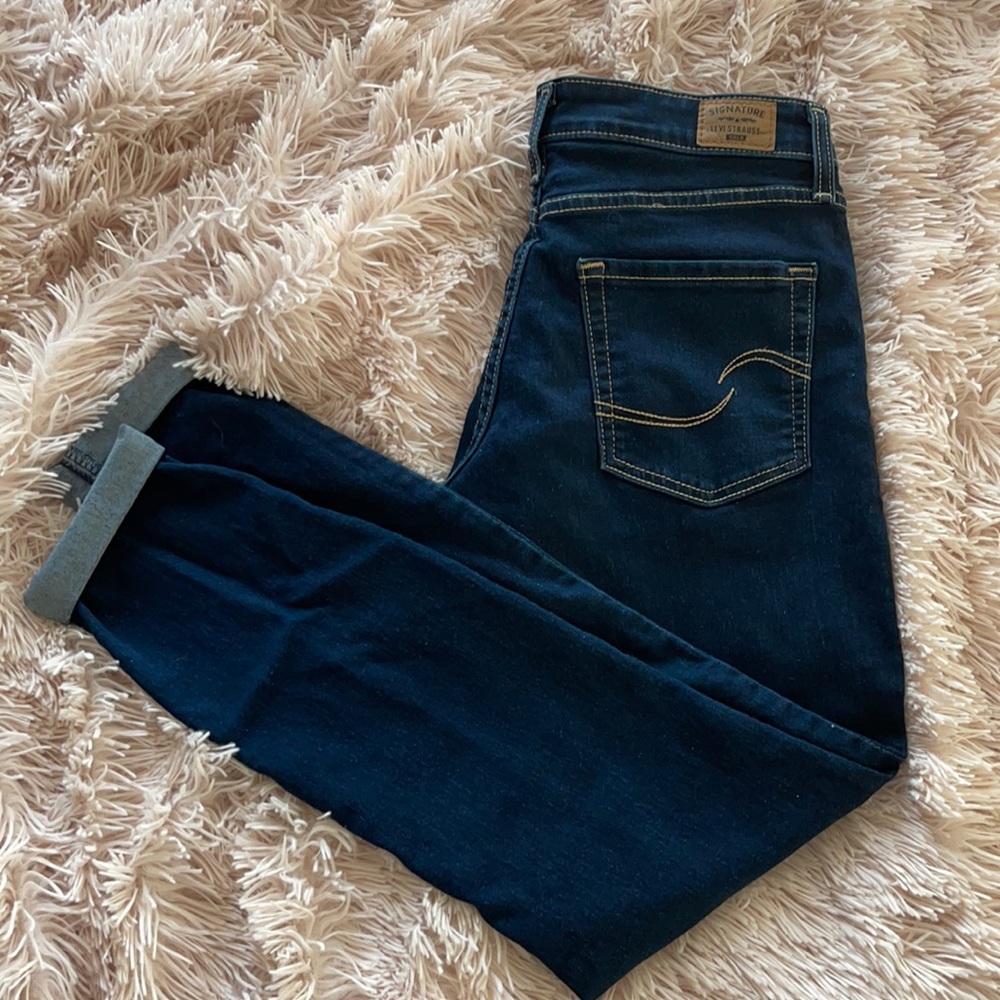 Levi’s mid rise skinny.